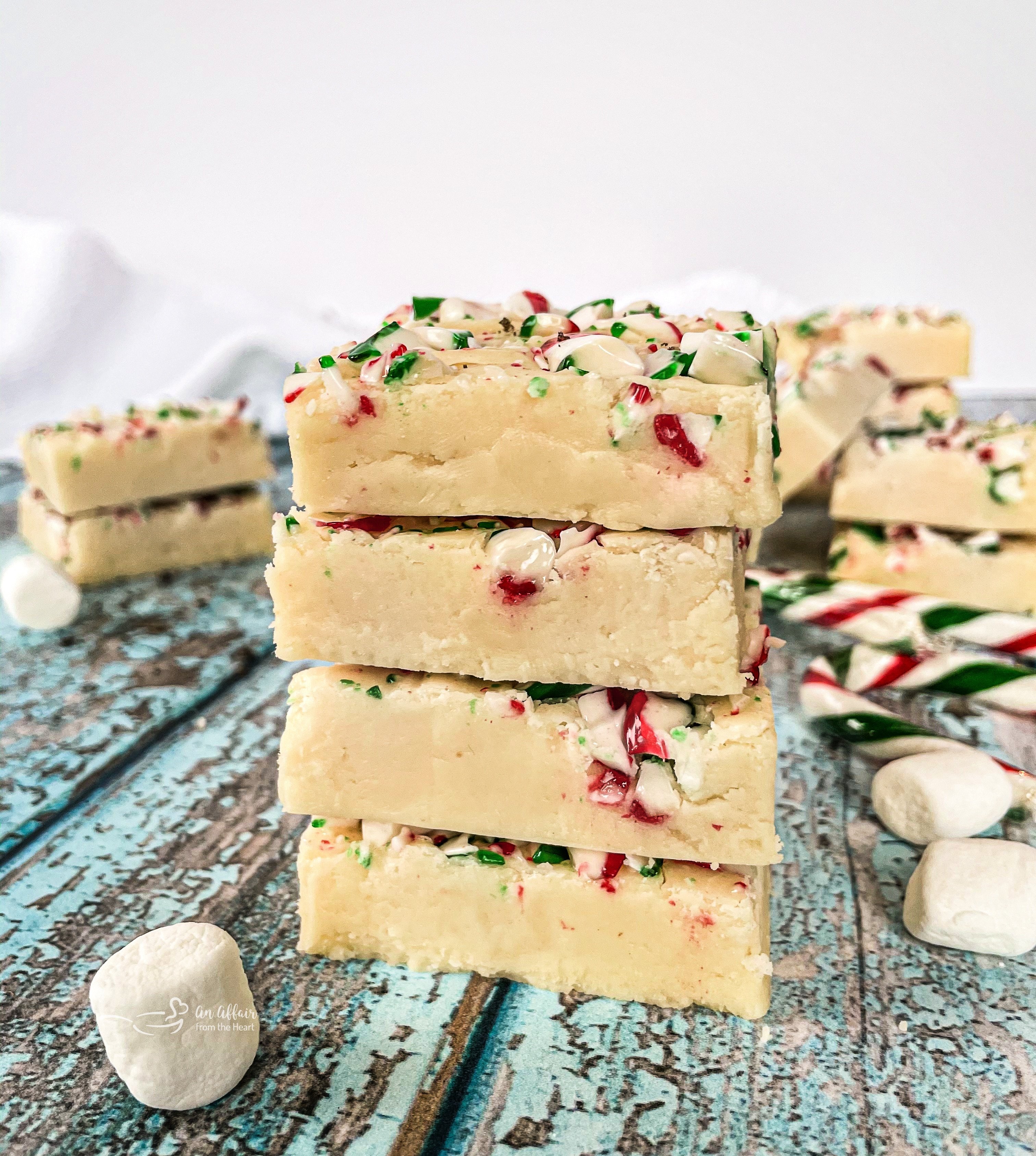 White chocolate peppermint fudge stacked on a table