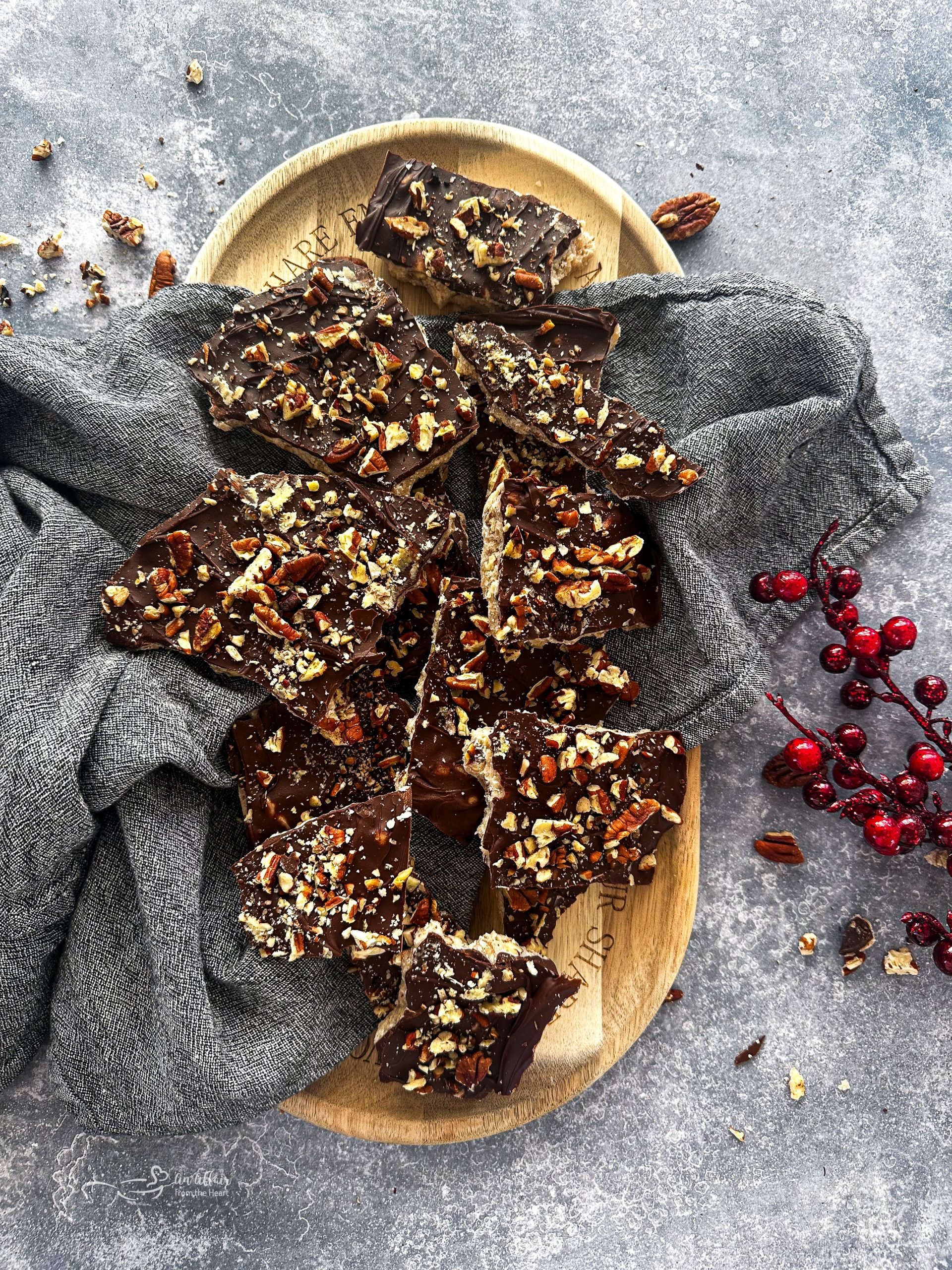 Close up of Toffee pieces on a gray napkin